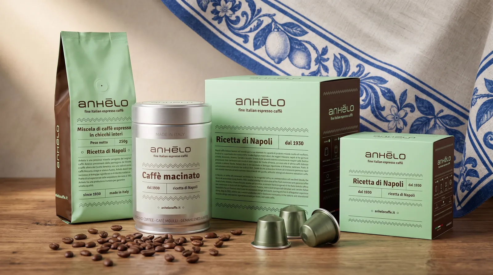 The Anhelo range (beans, ground coffee, pods and capsules) on a table with a Neapolitan tablecloth
